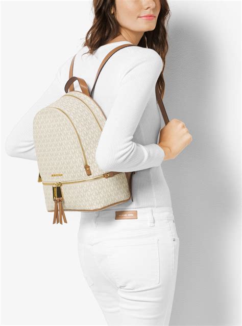 michael kors rhea backpack large vs medium|Michael Kors rhea zip backpack.